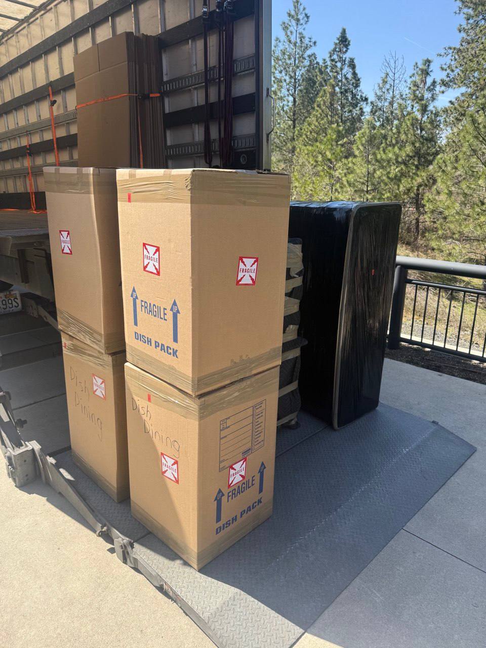 Dish pack boxes on the truck lift gate