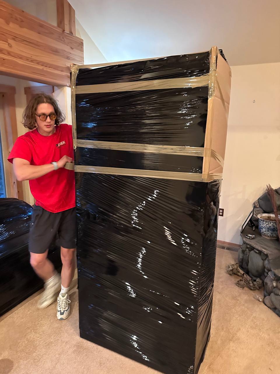 Wrapped wardrobe and Fanex moving boxes